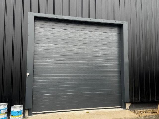 Porte Sectionnelle Industrielle : Création d’Ouverture & Pose